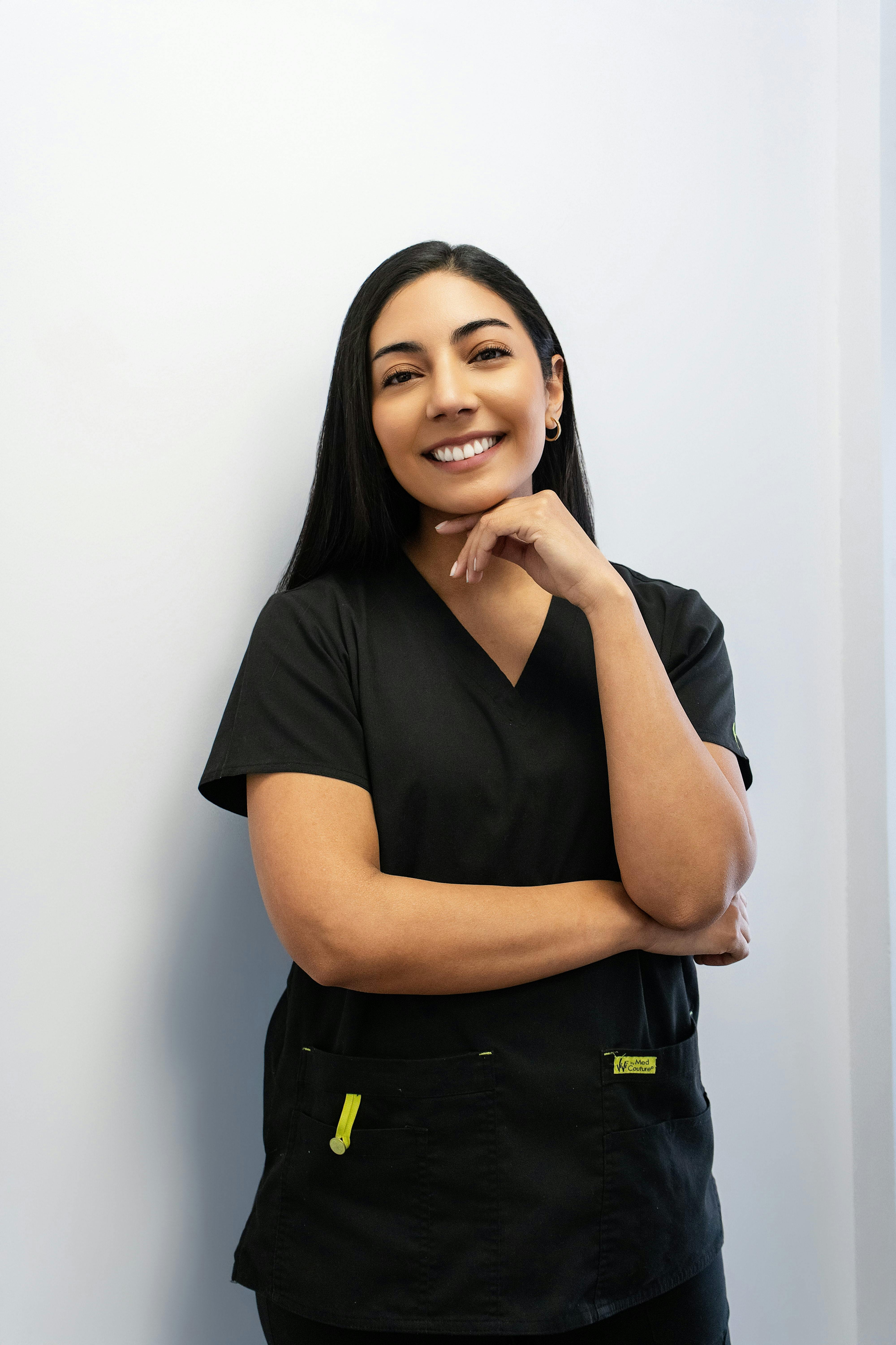 Professional dental practitioner smiling